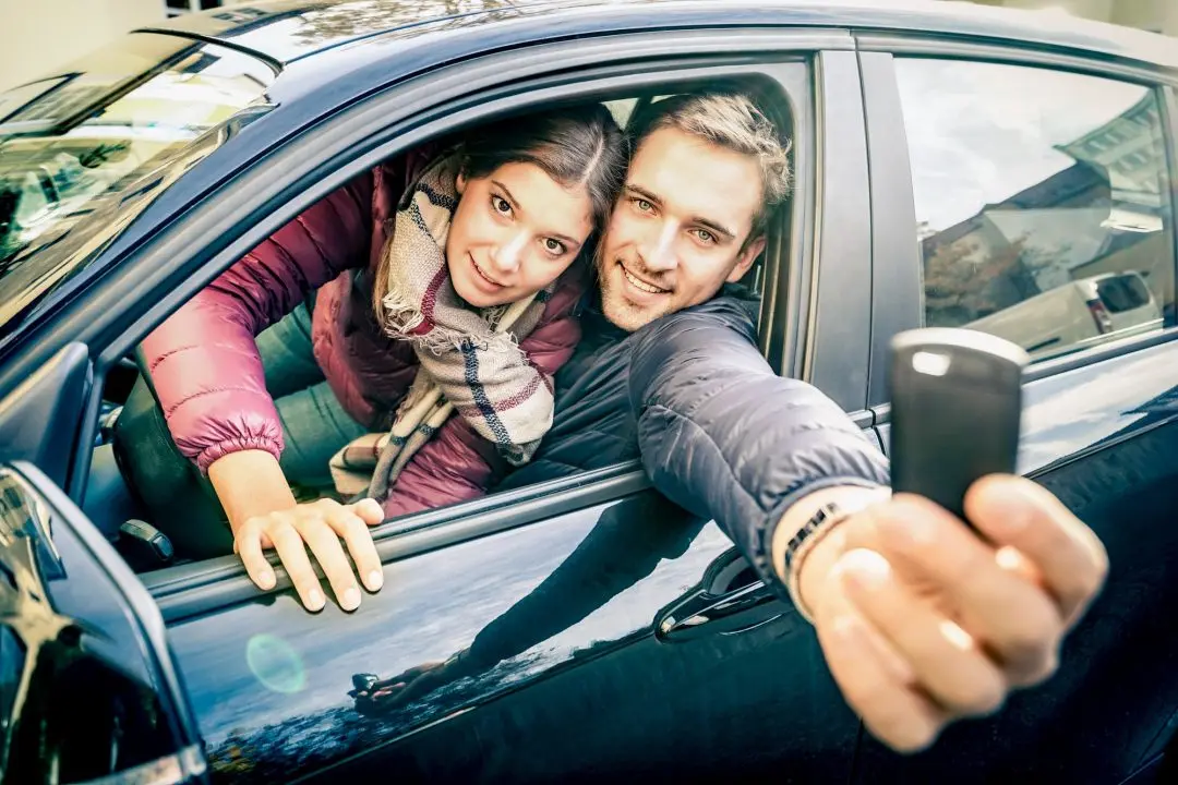 happy couple at car rent